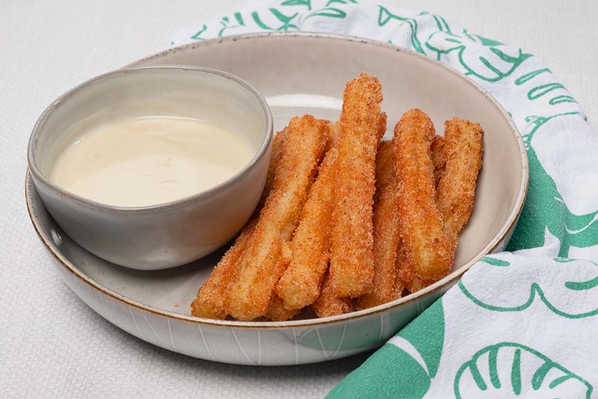 Li Hing Churros with Haupia Sauce - Thryveai.jpg